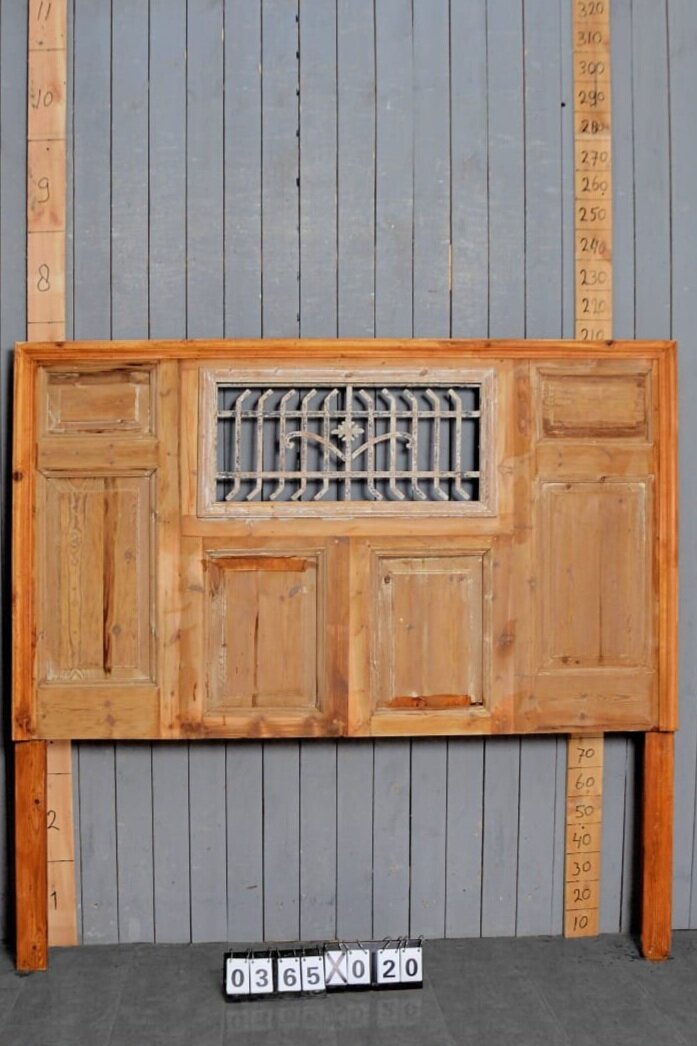 Antique headboard with metal